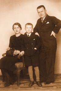 with his parents, around 1937-8