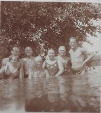 Parents with the friends at the swimming pool in Košice