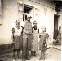 Family Pache in front of their house