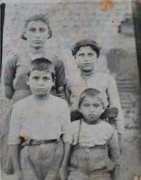 Janis Pataridis with his siblings