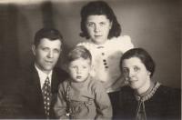 With his parents and brother 1943
