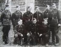 Group of noncommissioned officers from tank battalion: Kneller, from left: Carboch, Pražák, Pozner, Standing: Ostašov, Rampas, Palička, Porazík, Cilo (?), Tvrzník. Porazík and Palička with war cross 