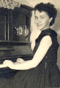 With her beloved piano