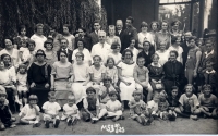 MUDr. Anna Schulzová (first row, centre, in a white dress with dark piping). Staff of the pædiatric ward of the Krč hospital, Prague 1927