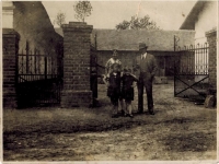 Horký family farm in the middle of village, courtyard gate, photo from 1930s