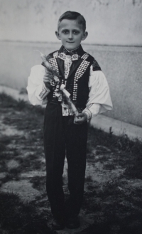 Josef Jančář after his First Communion, wearing a traditional folk costume