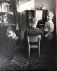 Left Jiří, Karel and Petr listening to a radio fairy tale, Prague about 1954