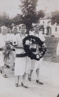 On the right, mother in the procession in Klenovice, Haná