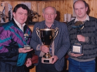 The victory in pigeon breeding, 1990s, with his father and his brother