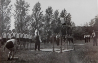 Uncle Zdeněk Švéda at the Sokol exercise in parallel bars in 1938