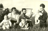With her mother and her father in the Spring of 1956. Mrs. Dospělová first from left 
