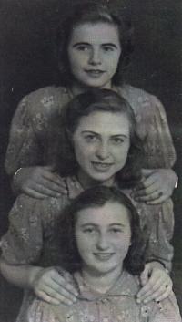 Emilie (below) with her friends, undated