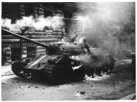 Smouldering tank 212 in Balbínova Street, 21 August 1968