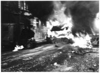 Probably Balbínova and Vinohradská streets - burning car, 21 August 1968