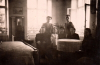 With her parents and other relatives in Spálov; around 1940 